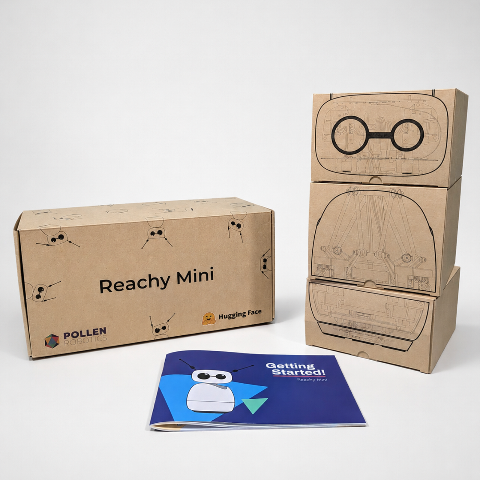Les trois boîtes du kit Reachy Mini